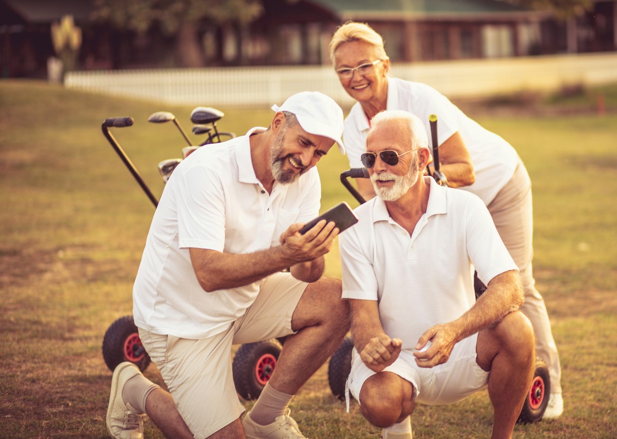 Friends enjoying golf together - active lifestyle at any age